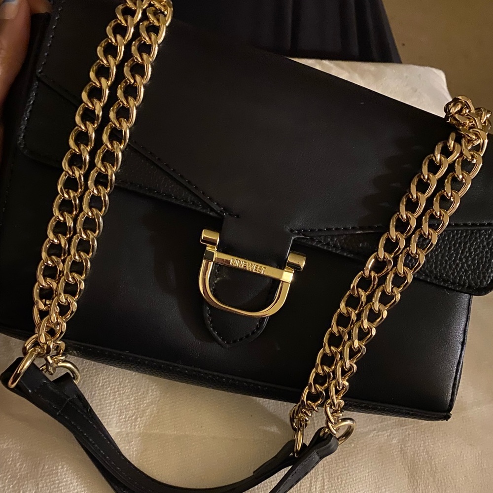 Gold chain leather handbag